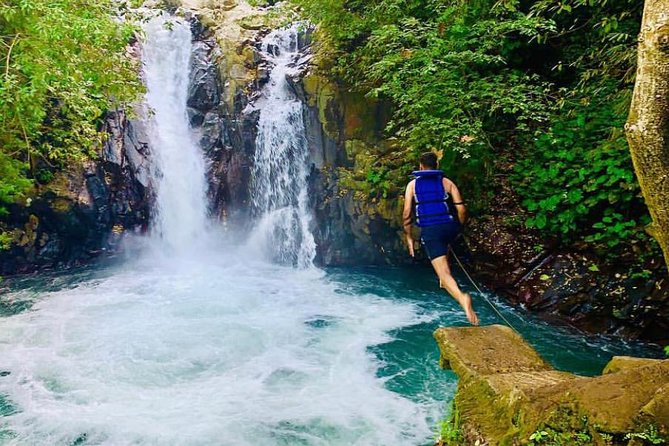 All Inclusive : Jumping Sliding at Aling- Aling Waterfall - Handara Gate - Lunch - The coffee plantation adds a slower Bali moment