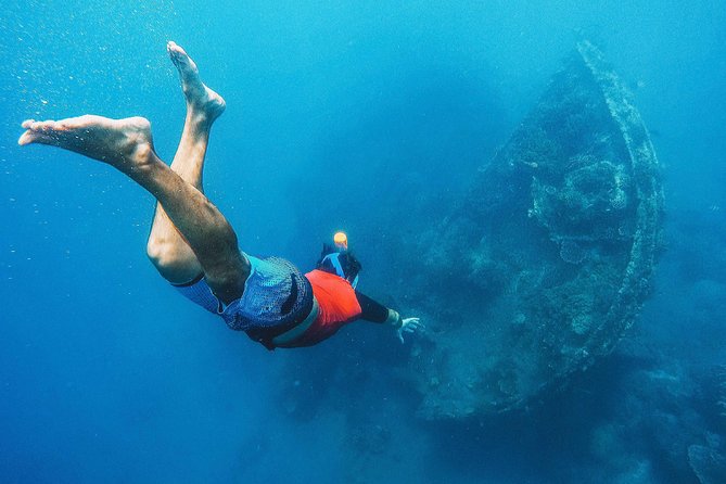Amed Bali Snorkelling: Japanese Shipwreck & Vienna Beach Tour - Lipah Beach and the boat to the wreck