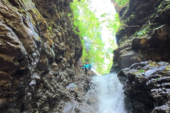 Bali Canyoning Trip – Explore Hidden Waterfalls & Gorges - Entering the canyon near Gitgit Subak Temple