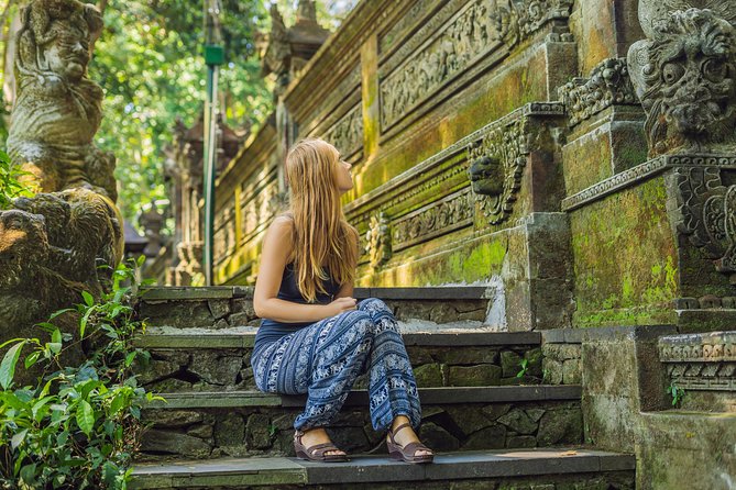 Bali Full Day Tour: Highlights of Ubud and Hidden Waterfall - Tukad Cepung Waterfall beneath the jungle
