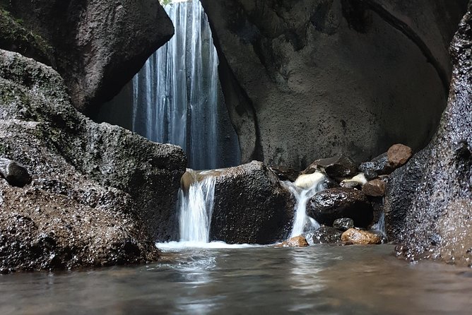 Bali Instagram Tour : Heaven Gate Tour - Tirta Gangga - Tukad Cepung Waterfalls - Tirta Gangga’s ponds, koi, and stone figures