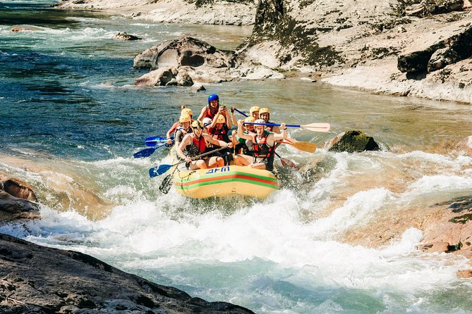 Bali Rafting Ubud with Lunch - Paddling past cliffs, rice fields, and waterfalls
