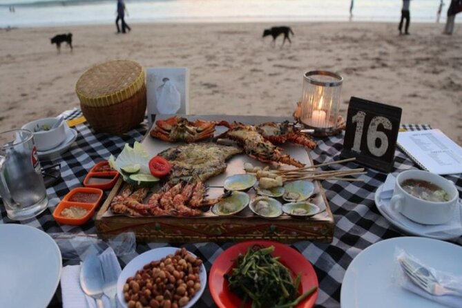 Bali Romantic Seafood Dinner under sunset jimbaran Beach - The sunset, beach tables, and night sky