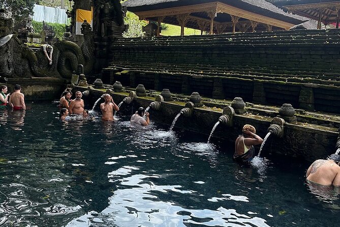 Bali Tirta Empul Tours Experience with Spiritual Cleansing - Cooling off at Ulu Petanu Waterfall