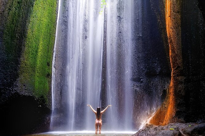 Bali Tour : Tegenungan - Tukad Cepung - Kanto Lampo - Tibumana Waterfall - Kanto Lampo: water over natural rock steps