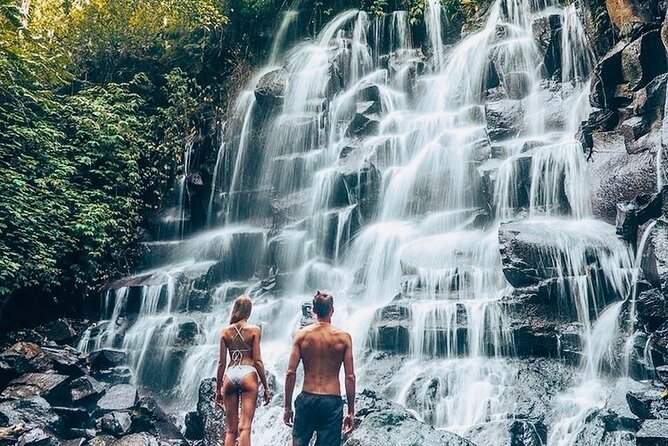 Bali: Ubud Highlights Tour with Private Guide and Transfers - Kanto Lampo, photographs, and wet rocks