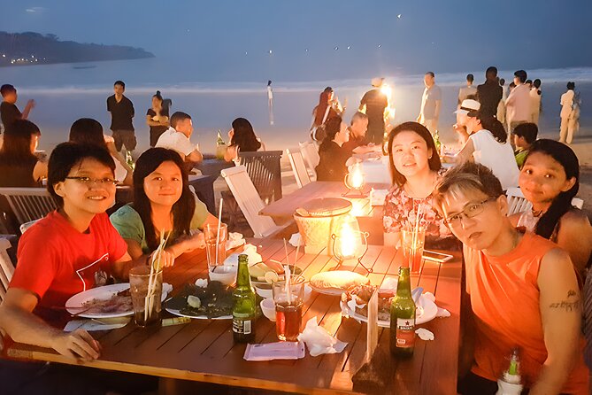 Bali Water Sports and Uluwatu Sunset Tour - Jimbaran Bay seafood dinner