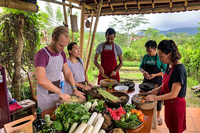 Balinese Vegan Cooking Class with Fresh Harvesting & Garden Tour - Harvesting ingredients before the knives come out