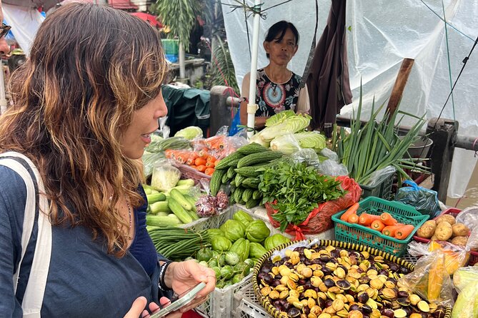 Denpasar Night Market Food Tour - A picnic beside the river under evening lights