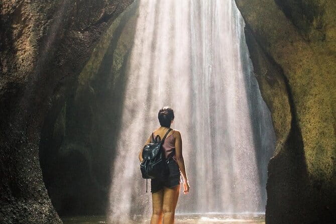 Eastern Bali and Besakih Temple Tour - Tukad Cepung Waterfall inside the cave