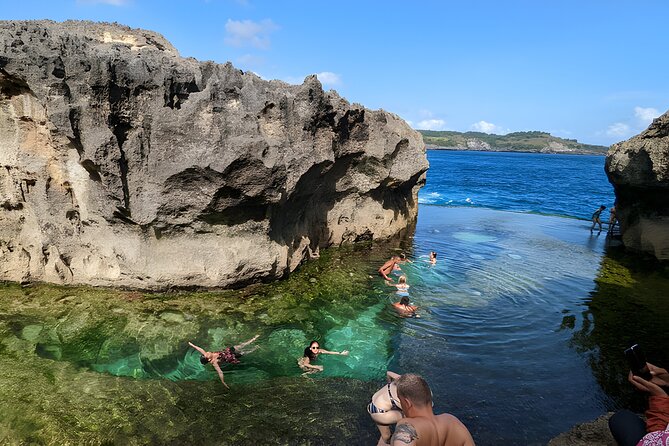 Full Day Nusa Penida Island Beach Tour From Bali - Guides, photos, and the human side of the day