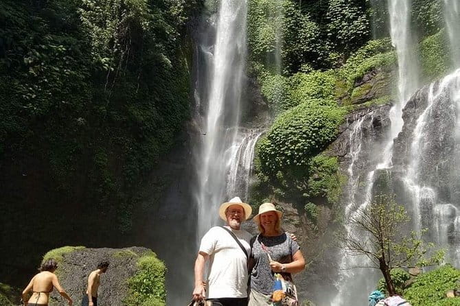 Full Day Private Tour All Inclusive Hidden Gems Bali Waterfall - Kanto Lampo turns stone into a staircase