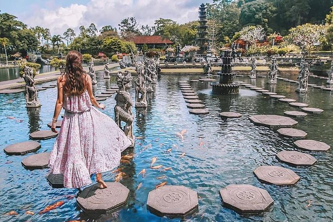 Gate of Heaven - Tirta Gangga Royal Water Palace - Tukad Cepung Waterfall - Tirta Gangga’s royal pools and koi ponds