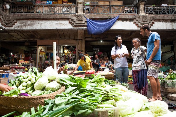 Half-Day Ubud Heritage Food Tour - Tasting shredded chicken, noodles, cakes, and satay