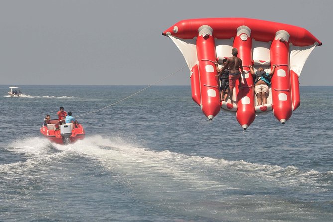 Half Day Watersport Combine With Uluwatu Incredible Sunset And Kecak Fire Dance - From Tanjung Benoa speed to Uluwatu cliffs