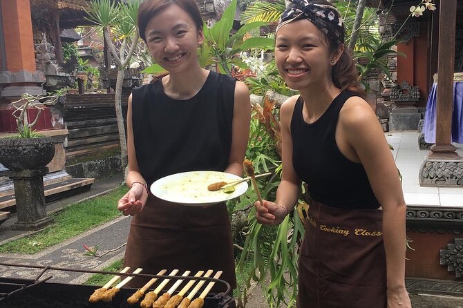 Jambangan Bali Cooking Class - Try rindik and coconut oil making