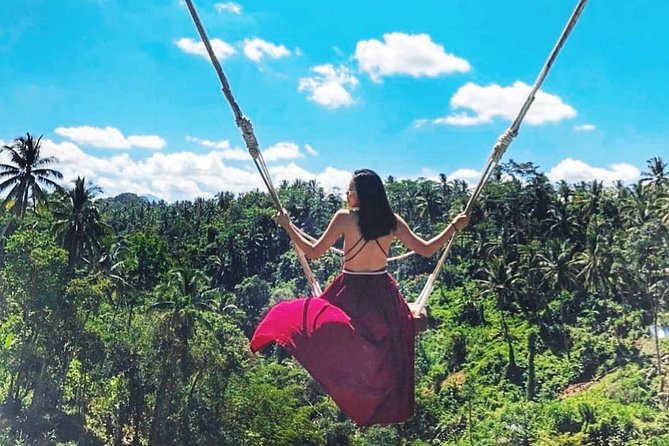 Jungle Swing - Volcano - Water Temple - Monkey Forest and Waterfall Tour - Ubud Monkey Forest is lively, green, and unpredictable