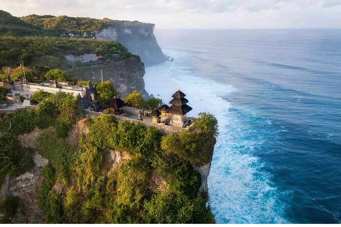 Kecak Fire Dance and Uluwatu Temple with Private Car Service - Exploring the temple above the sea