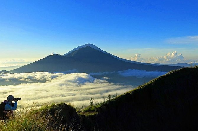 Mount Batur Sunrise Trekking Guide - Climbing toward the summit before dawn
