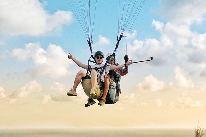 Paragliding Bali Nusa Dua cliff with Free Photo/Videos - A first flight that asks little of you