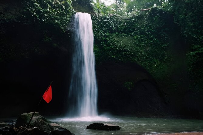 Private Full-Day Tour: The Beauty of Bali Waterfall Trip - Kanto Lampo’s stepped-rock cascade