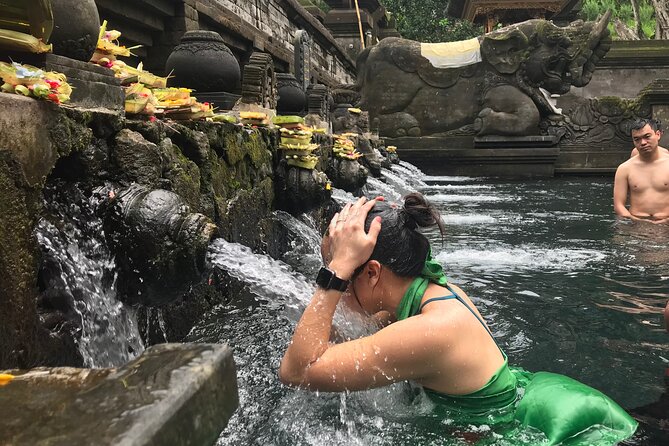Private Full Day Tour to Ubud Highlights with Giant Swing - Tirta Empul, where ritual bathing remains a living practice