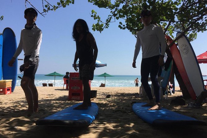 Private surf lesson - Entering the waves at Kuta Beach