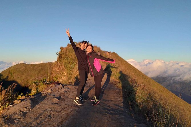 Private Tour Mount Batur Sunrise Trekking and Natural Hot Spring - Reaching the 1,717-meter summit before sunrise