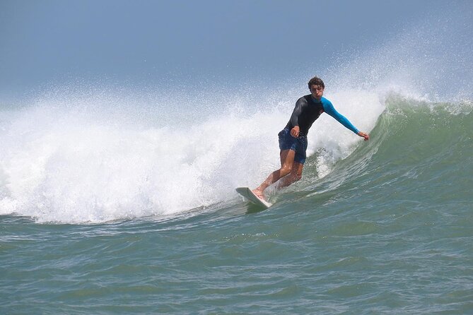 The funniest private 2 hour surf lesson, Canggu - Into the waves at Canggu Beach