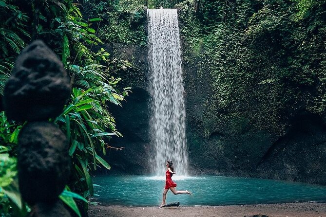 Trunyan Cemetery, Hot Spring, Penglipuran Village, and Waterfall Tour - Tibumana Waterfall closes the route