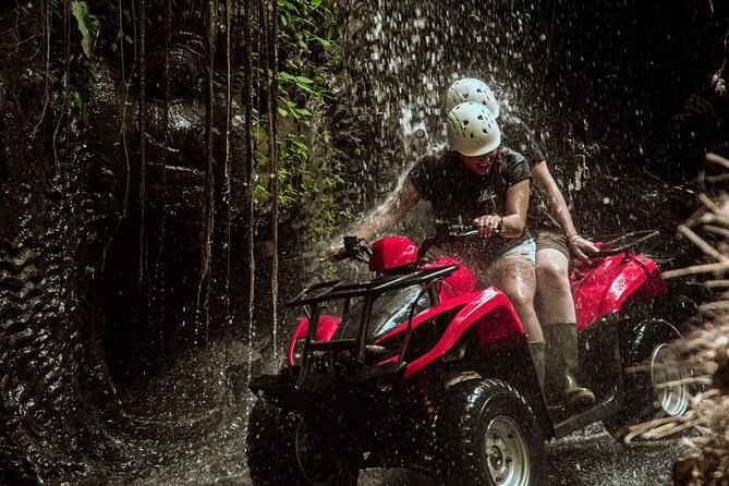 Ubud Bali ATV Quad Bike Legong Temple cave with Lunch and Pool - Rafting the Ayung River through rainforest