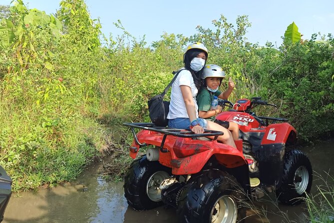 Ubud Countryside Sightseeing Tour by ATV Ride - Farmland, hills, and river crossings