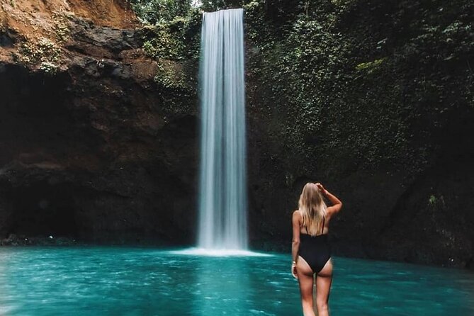 Ubud Day Tour : Waterfall, Temple and Local Night Market Tour - Tibumana Waterfall: a cool first look at Bali’s nature