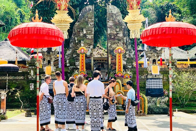 Ubud Private Tour: Waterfalls, Temple and Rice Terraces Swing - Kanto Lampo Waterfall and natural rock pools