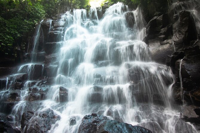 Ubud Waterfalls and Rice Terraces Private Day Tour - Tukad Cepung Waterfall feels tucked inside the rock